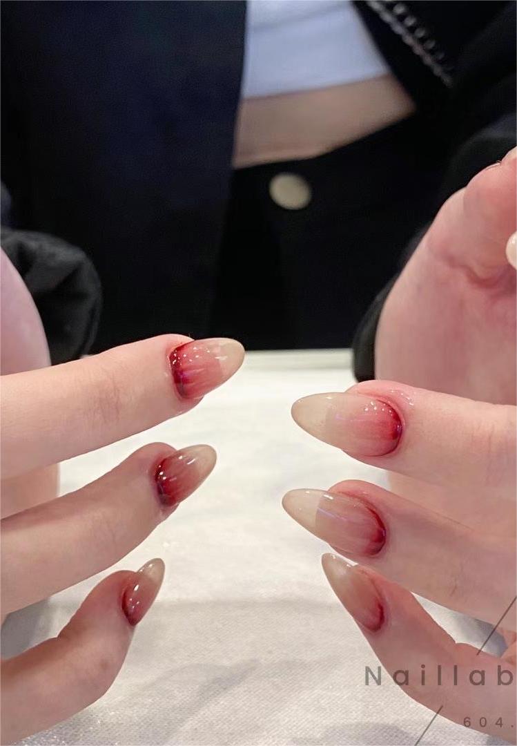 Ombre nail design on long nails, red color